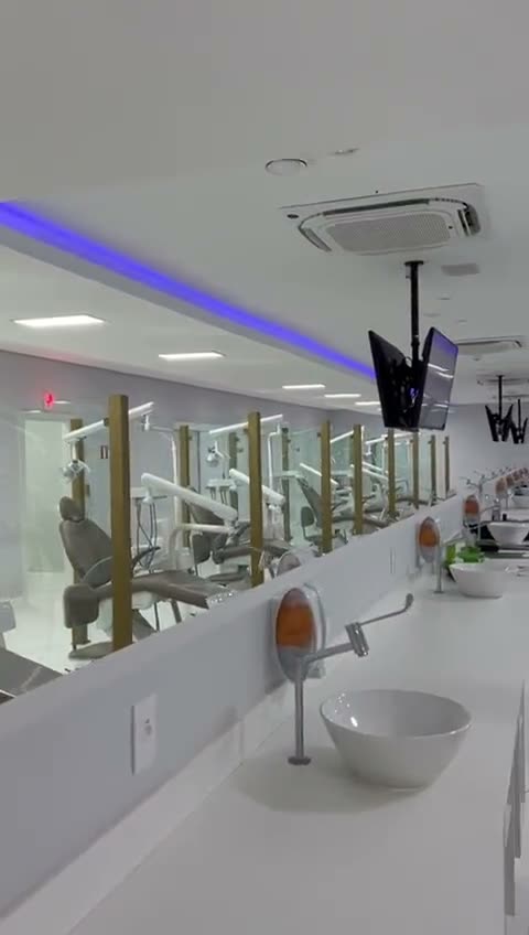 Vídeo: bancadas com cubas e consultórios odontológicos com iluminação azul no forro